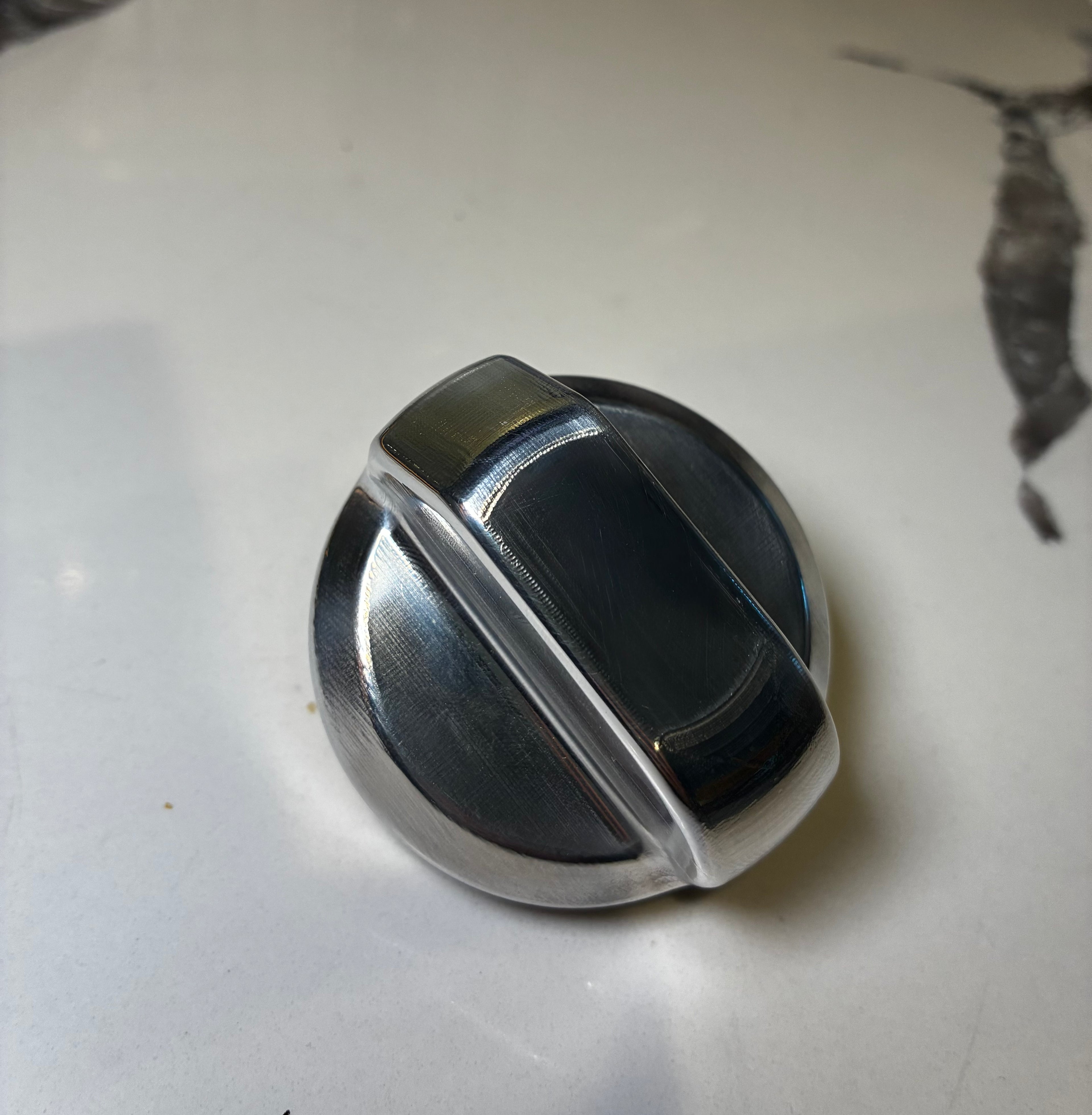 Stylish knob on a white surface